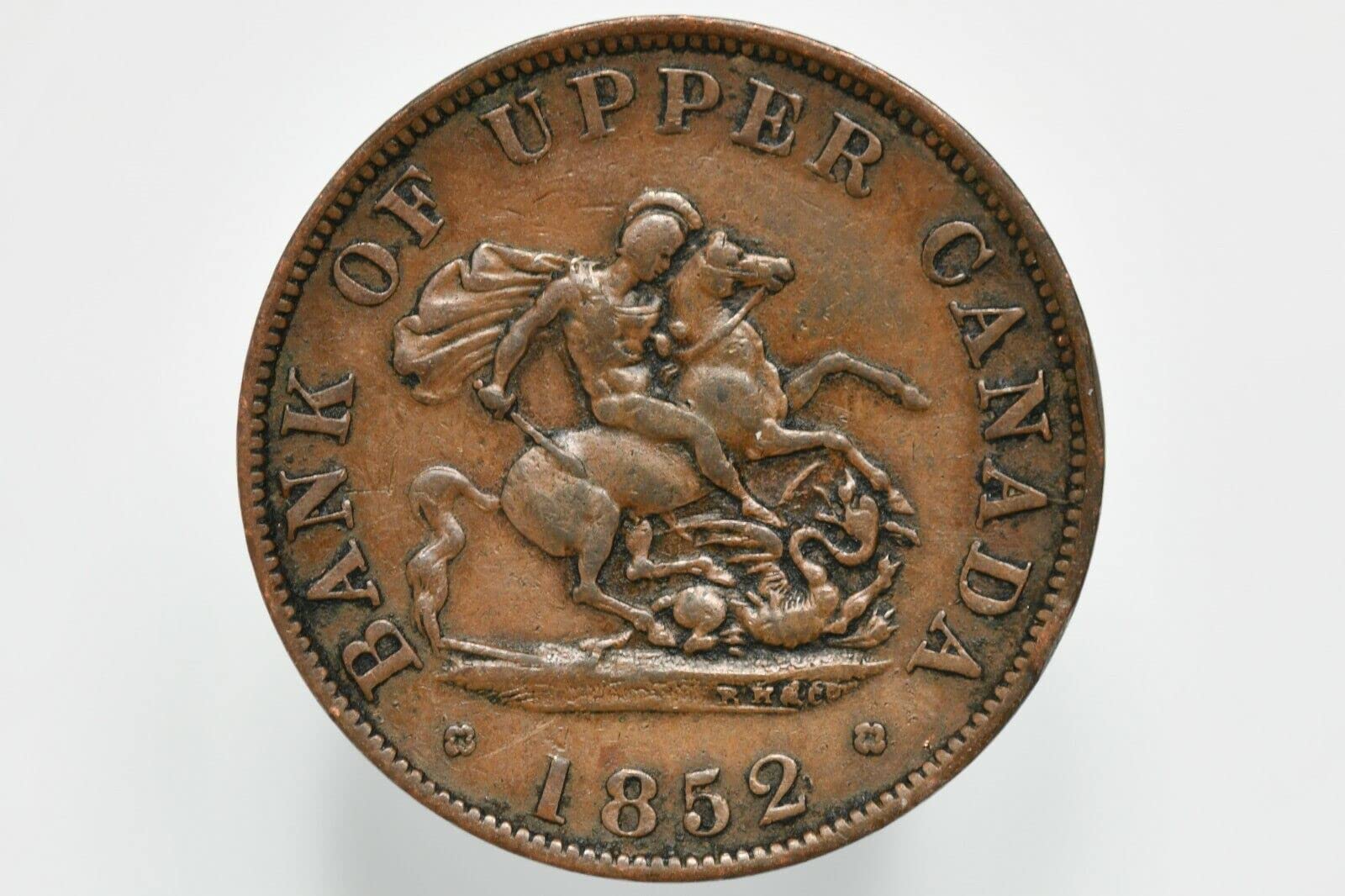 1850-1857 Bank Of Upper Canada One Half Cent Coin. Pioneer Era